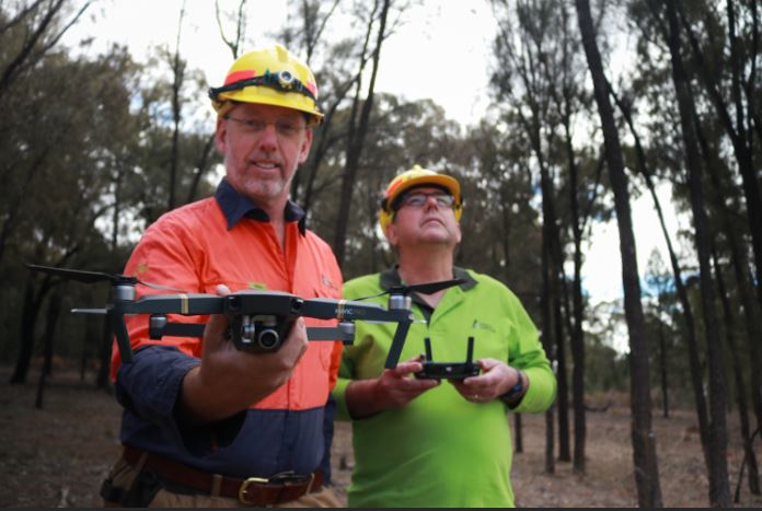 Caption: Forestry Corporation Drone Operators Eric Smith (left) and Conan Rossler.